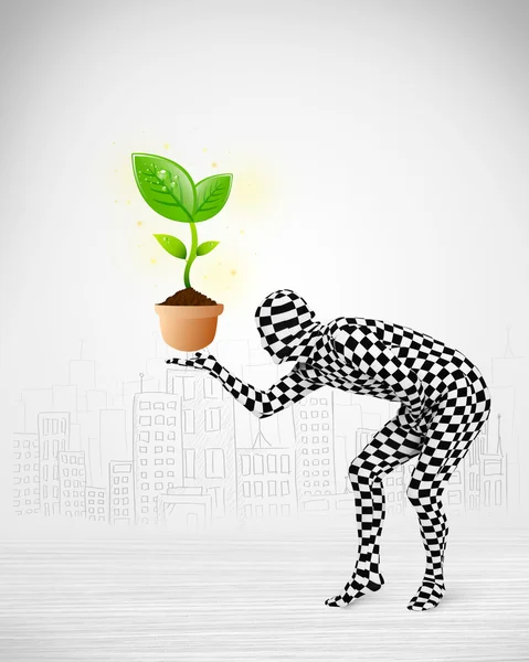 Man in full body suit with eco plant — Stock Photo, Image