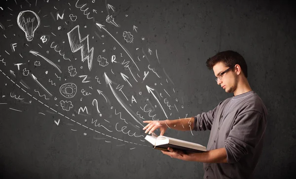 Young man reading a book — Stock Photo, Image