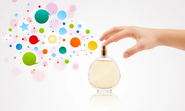 Colorful bubbles from beautiful perfume bottle — Stock Photo, Image