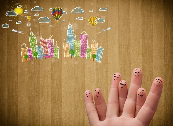 Glad smiley fingrar tittar på färgglada handrawn stadsbild — Stockfoto