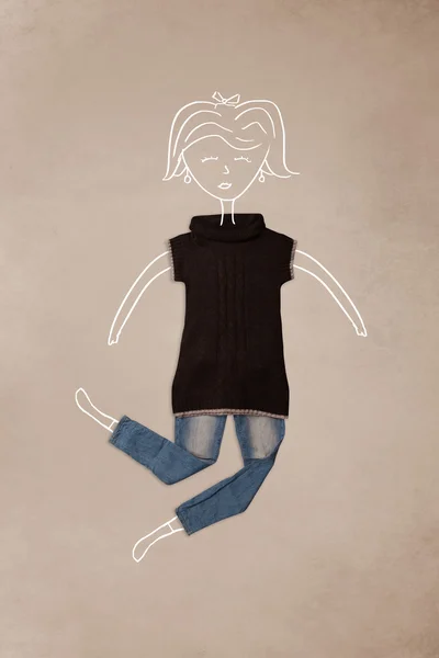 Umístěné oblečení v akci s kresbou ženy — Stock fotografie