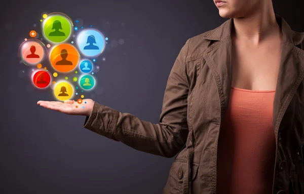 Social network icons in the hand of a woman — Stock Photo, Image