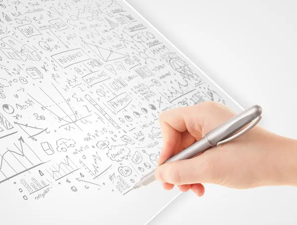 Human hand sketching ideas on a white paper — Stock Photo, Image