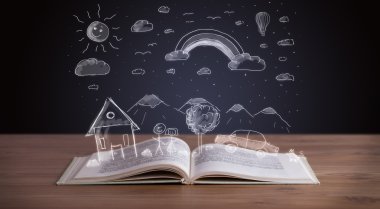 Elle çizilmiş peyzaj ile açık kitap