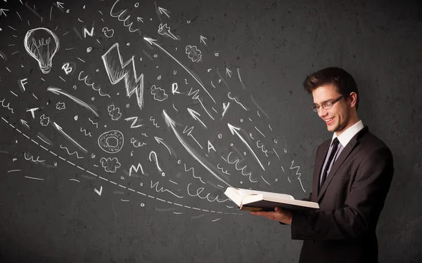 Young man reading a book — Stock Photo, Image