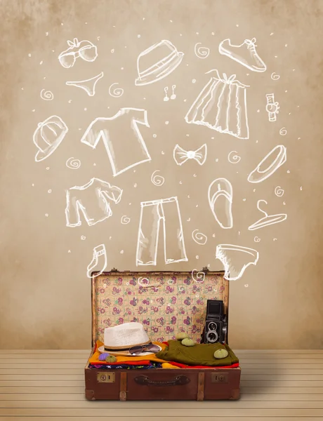 Traveler luggage with hand drawn clothes and icons — Stock Photo, Image