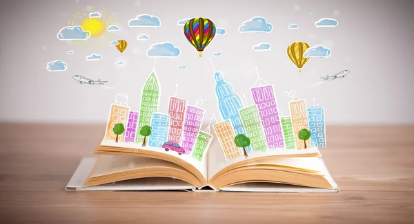 Cityscape drawing on open book — Stock Photo, Image