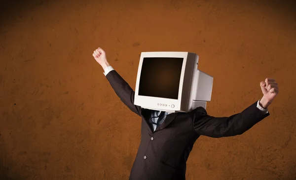 Uomo d'affari con un monitor in testa e spazio vuoto marrone — Foto Stock