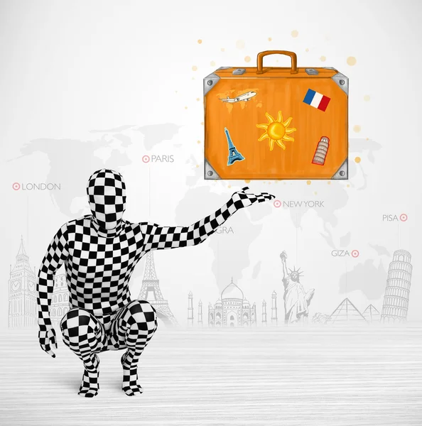 Mężczyzna w garniturze prezentuje walizkę wakacje — Zdjęcie stockowe