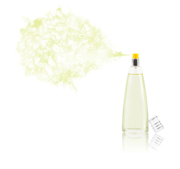 Perfume bottle spraying colored scent — Stock Photo, Image