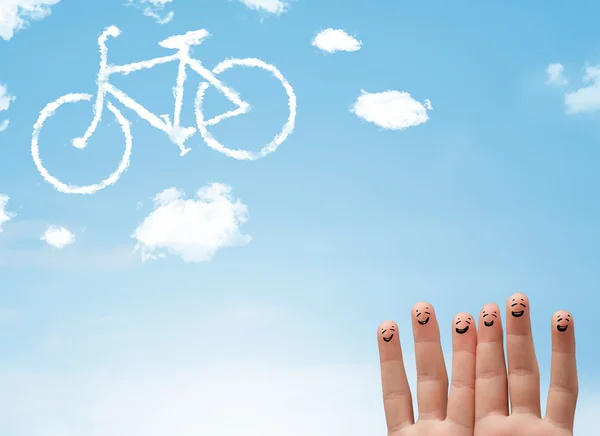 Felices dedos sonrientes mirando una nube en forma de bicicleta — Foto de Stock