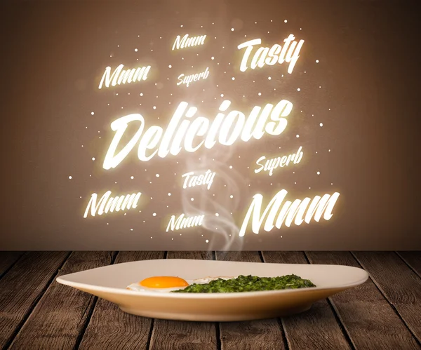 Food plate with delicious and tasty glowing writings — Stock Photo, Image