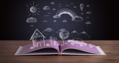 Elle çizilmiş peyzaj ile açık kitap