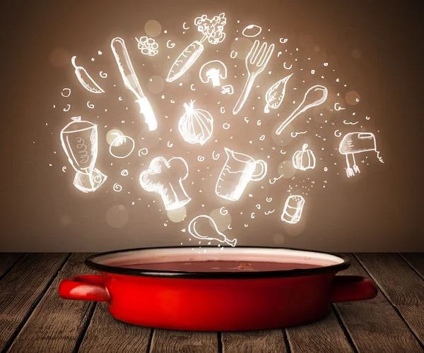 Cooking icons coming out from cooking pot — Stock Photo, Image