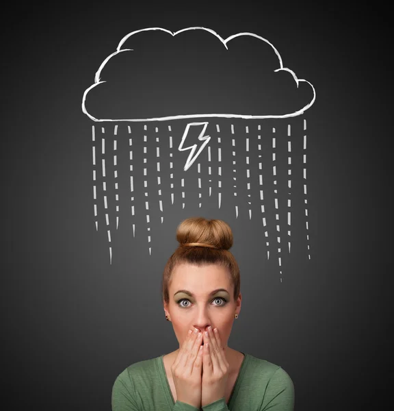 Young woman with thundercloud above her head — Stock Photo, Image