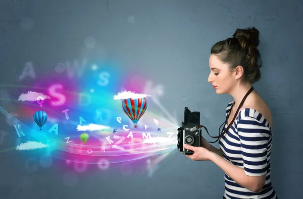 Photographer with camera and abstract imaginary — Stock Photo, Image