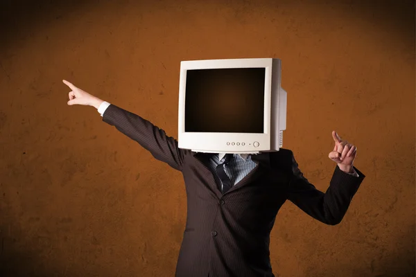 Business man with a monitor on his head and brown empty space — Stock Photo, Image