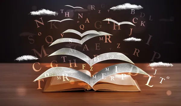 Páginas y letras brillantes volando de un libro — Foto de Stock