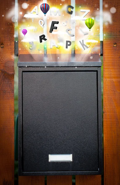 Renkli harflerle dolu posta kutusu — Stok fotoğraf