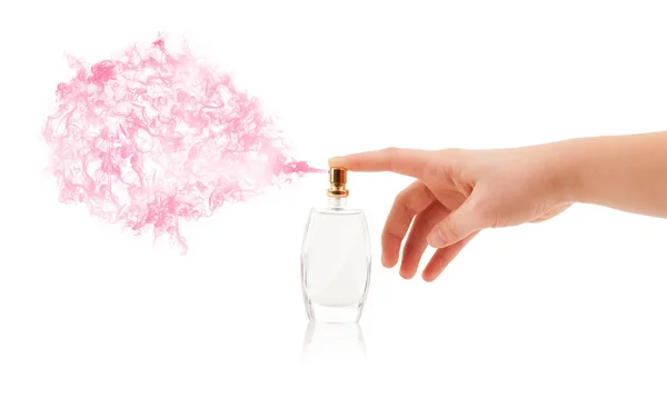 Woman hands spraying perfume — Stock Photo, Image