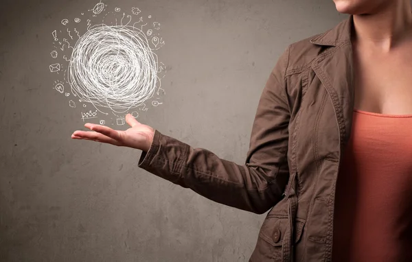 Chaos concept in the hand of a woman — Stock Photo, Image