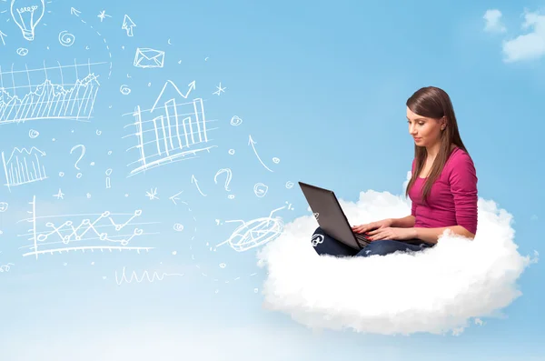 Young woman sitting in cloud with laptop — Stock Photo, Image