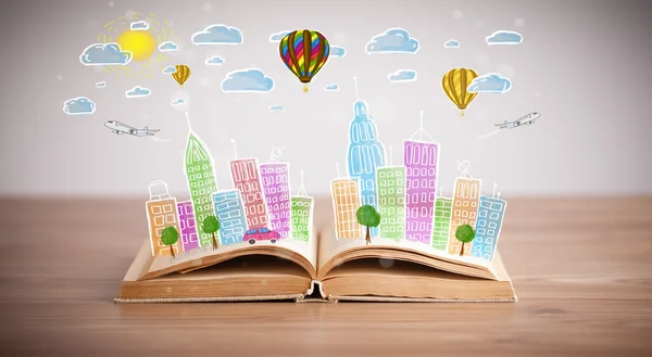 Cityscape drawing on open book — Stock Photo, Image