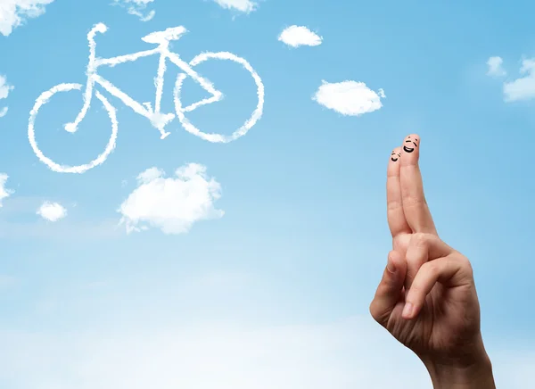 Felices dedos sonrientes mirando una nube en forma de bicicleta — Foto de Stock