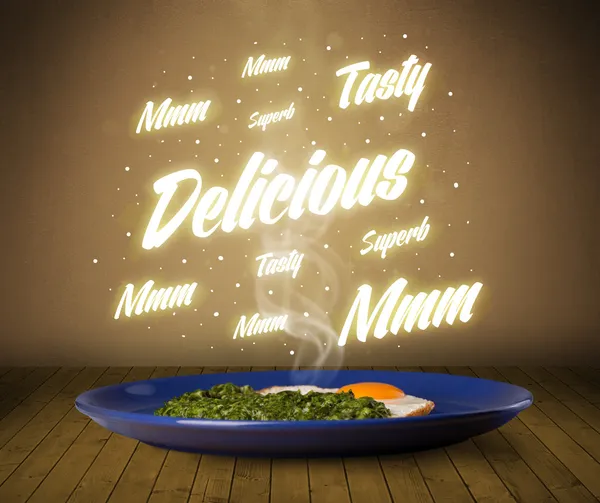 Food plate with delicious and tasty glowing writings — Stock Photo, Image