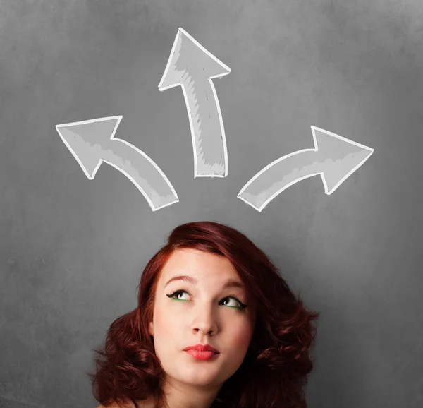 Young woman thinking with arrows above her head