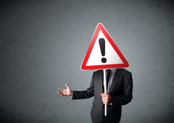 Бизнесмен с восклицательным знаком
