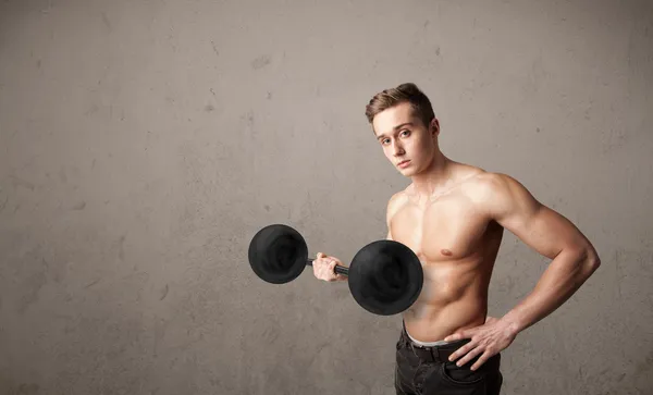 Muscular man lifting weights — Stock Photo, Image