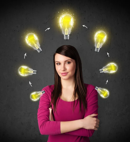 Young woman thinking with lightbulb circulation around her head — Stock Photo, Image