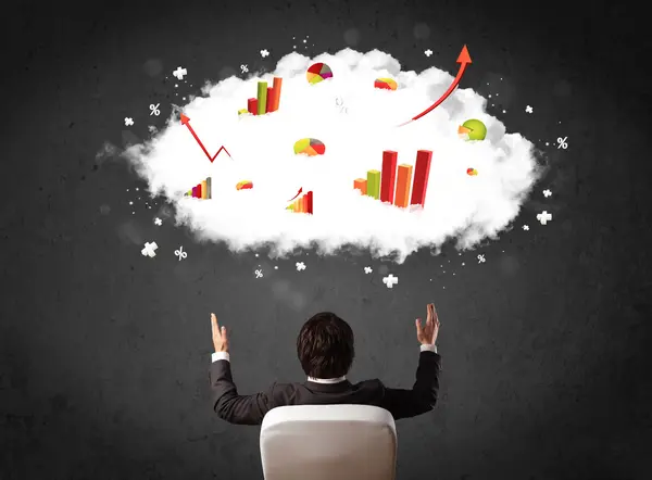 Businessman with charts in a cloud above his head — Stock Photo, Image