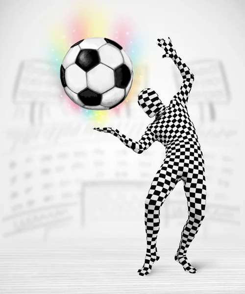 Man in full body suit holdig soccer ball — Stock Photo, Image