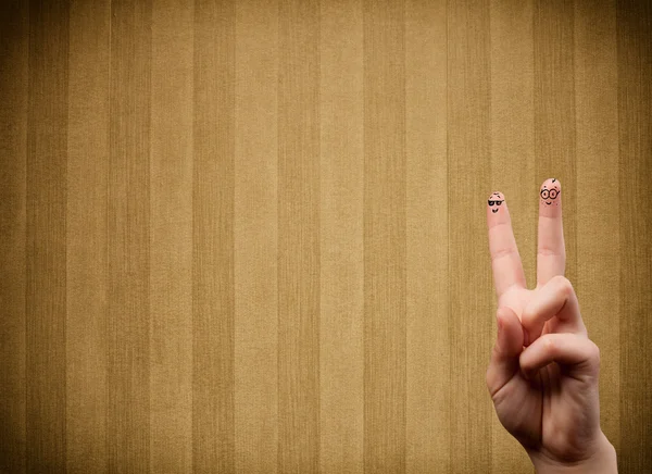 Happy finger smileys with vintage stripe wallpaper background — Stock Photo, Image