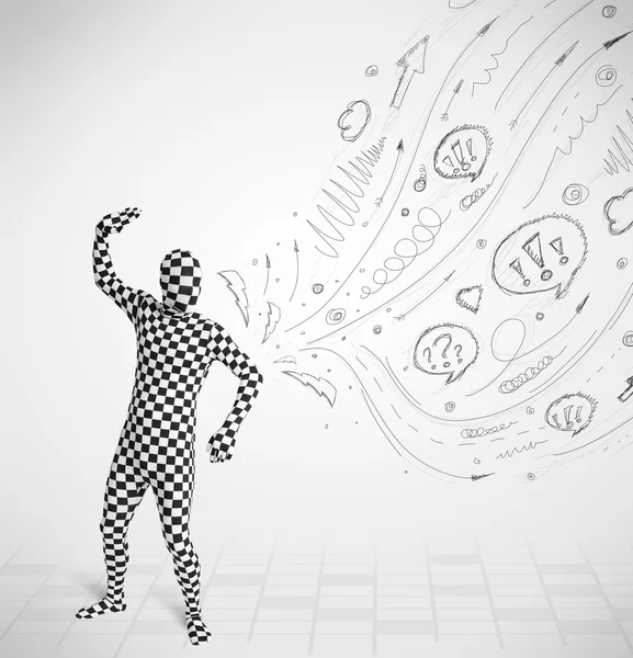 Guy in body suit morphsuit looking at sketches and doodles — Stock Photo, Image