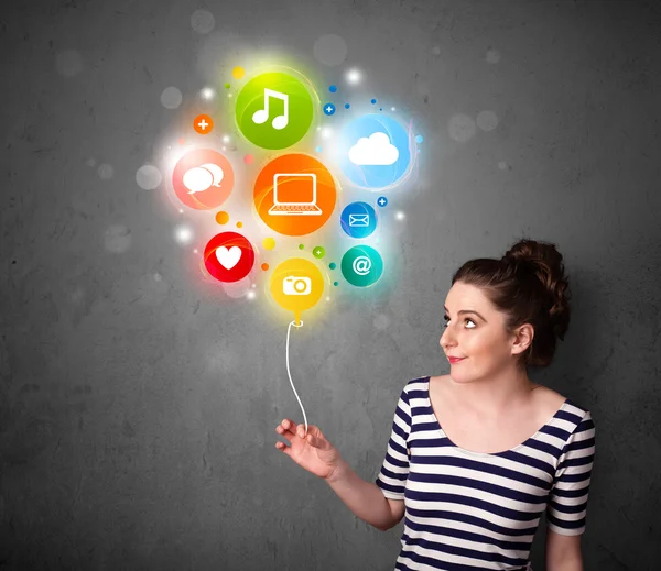 Woman holding social media balloon — Stock Photo, Image