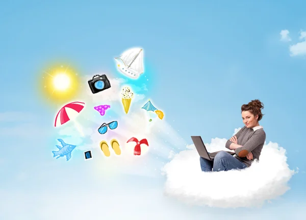 Young businessman sitting in cloud with laptop — Stock Photo, Image