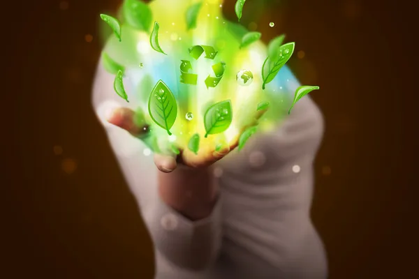 Young woman presenting eco green leaf recycle energy concept — Stock Photo, Image