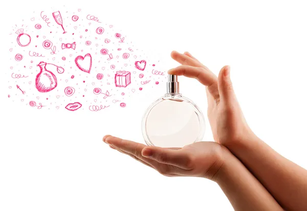 Sketches coming out from beautiful perfume bottle — Stock Photo, Image