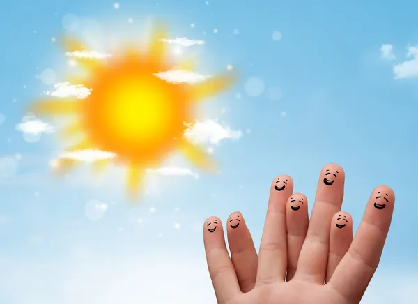 Alegre emoticonos dedo con sol brillante y nubes ilustración —  Fotos de Stock