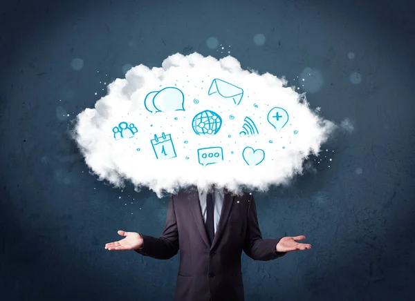 Man in suit with cloud head and blue icons — Stock Photo, Image