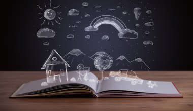 Elle çizilmiş peyzaj ile açık kitap