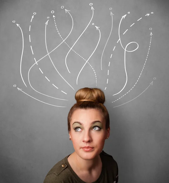 Young woman with arrows coming out of her head — Stock Photo, Image