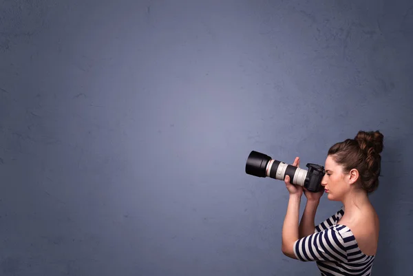 Photographer shooting images with copyspace area — Stock Photo, Image
