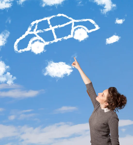 Chica joven mirando la nube del coche en un cielo azul —  Fotos de Stock