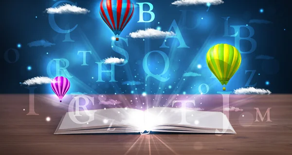 Otwarta książka ze świecącymi fantazjami abstrakcyjne chmury i balony — Zdjęcie stockowe