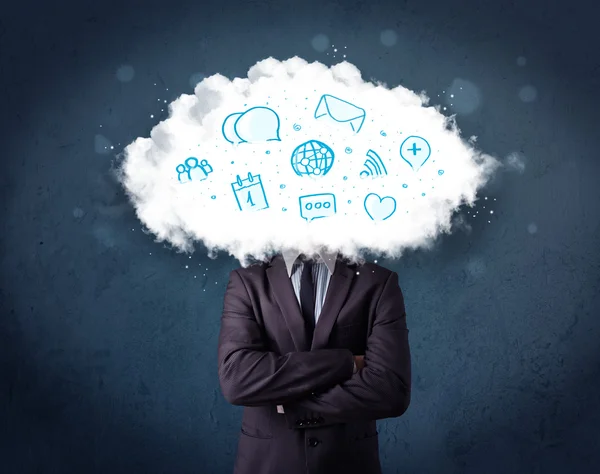 Man in suit with cloud head and blue icons — Stock Photo, Image