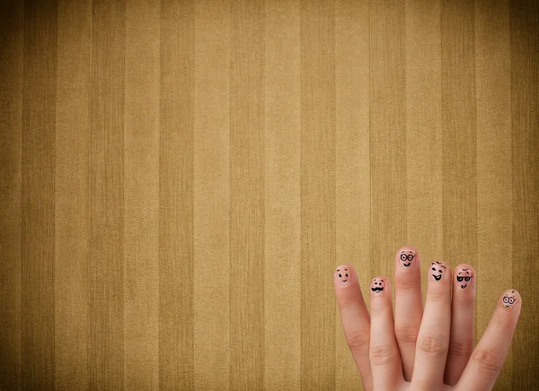 Happy finger smileys with vintage stripe wallpaper background — Stock Photo, Image
